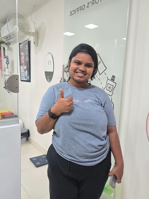 A happy patient giving a thumbs up after treatment at The Tooth Corner, Bellandur