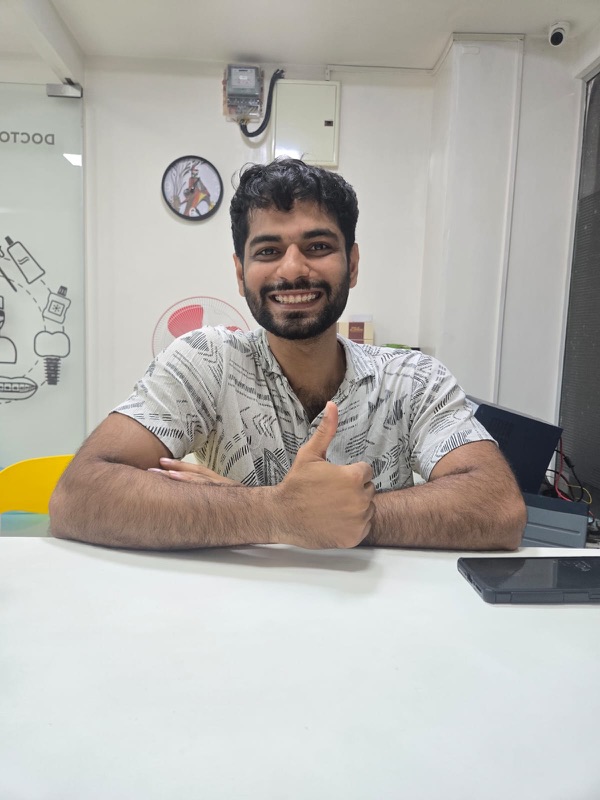 A happy patient giving a thumbs up after treatment at The Tooth Corner