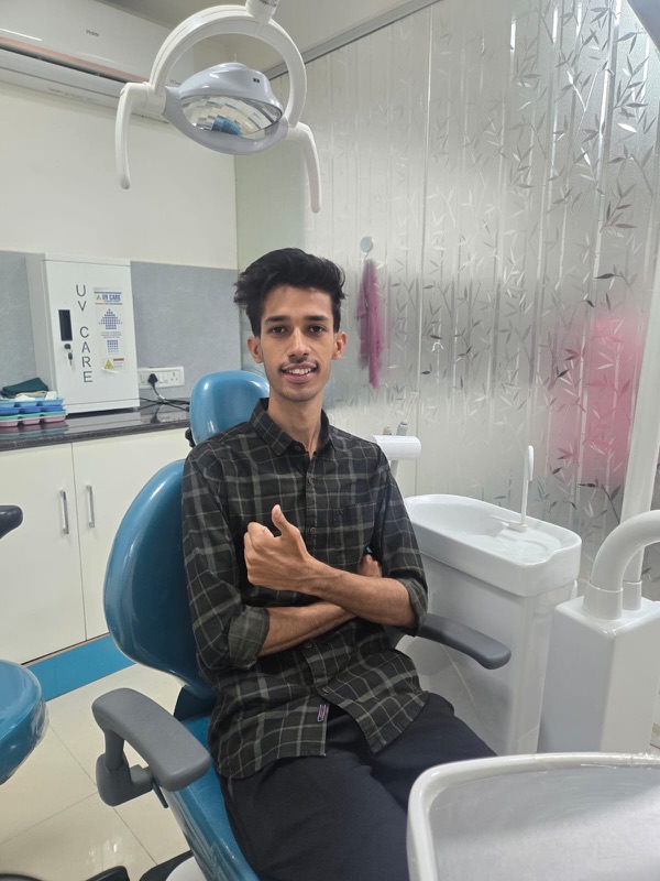 A happy patient giving a thumbs up after treatment at The Tooth Corner, Bellandur