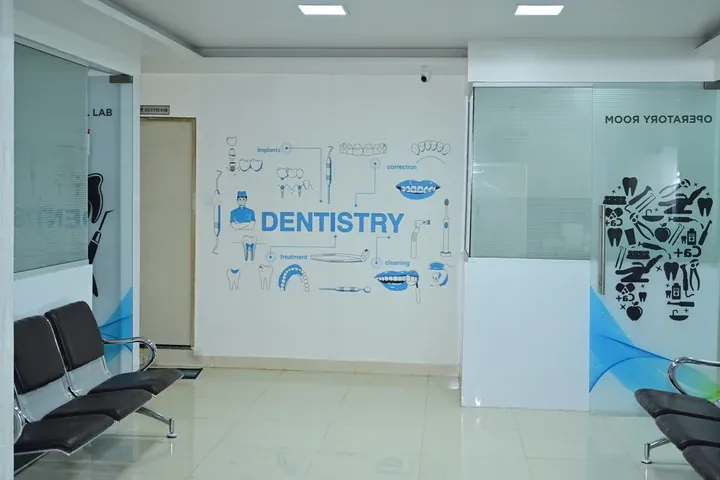 Waiting area with DENTISTRY wall art at The Tooth Corner